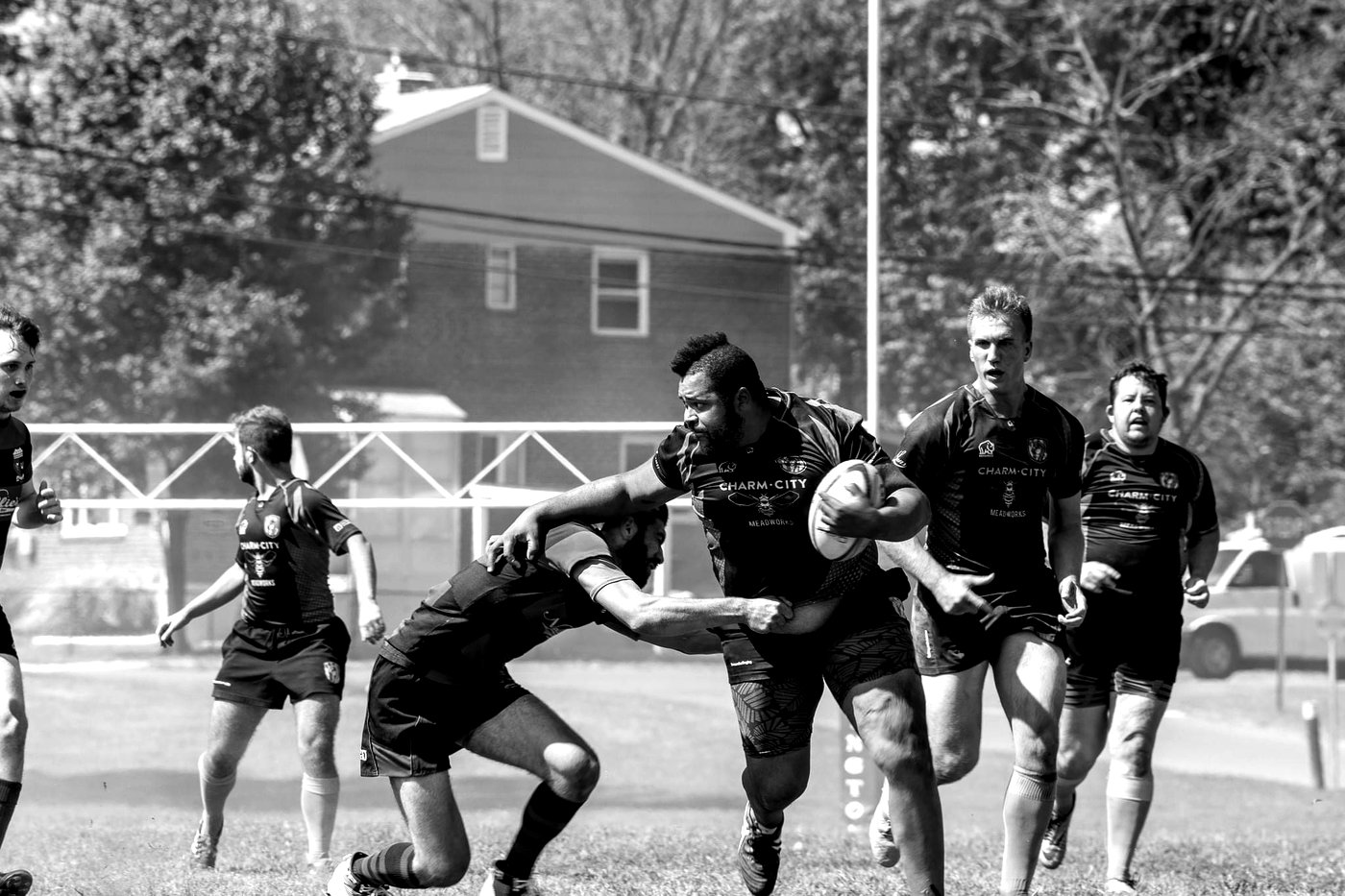 Breaking a tackle in a club rugby match